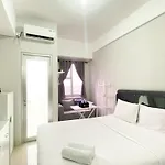 Homey And Warm Studio Transpark Juanda Bekasi Timur Apartment By Travelio